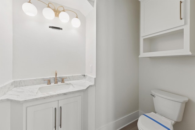 23015 Lunes, Galveston, TX 77554 - half bath featuring toilet, vanity, and baseboards