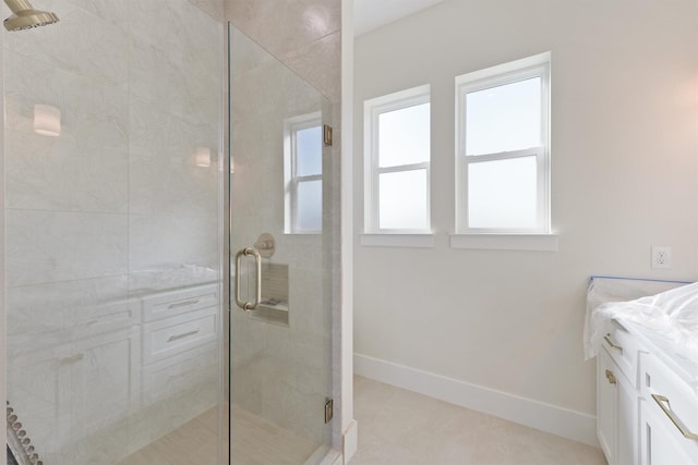 23015 Lunes, Galveston, TX 77554 - full bath with a stall shower, vanity, and baseboards