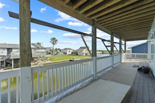 23015 Lunes, Galveston, TX 77554 - deck with a water view, a residential view, and a yard