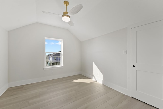 23015 Lunes, Galveston, TX 77554 - bonus room with a ceiling fan, light wood-type flooring, vaulted ceiling, and baseboards