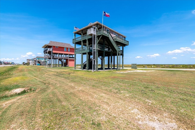 view of property's community with a yard