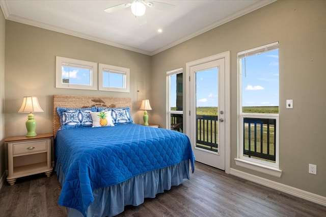 bedroom featuring multiple windows, dark wood-type flooring, access to exterior, and ceiling fan