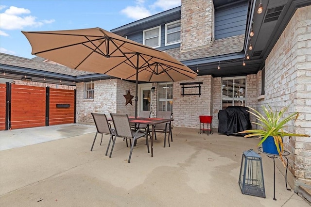 view of patio / terrace with a grill