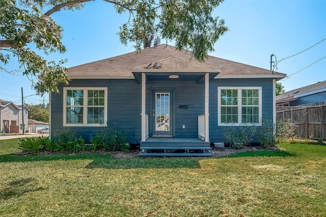 bungalow with a front yard