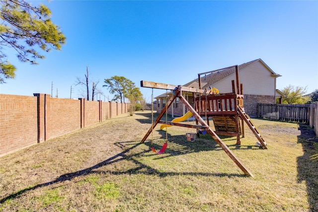 view of jungle gym featuring a yard