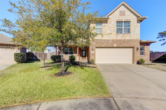 front of property with a garage and a front lawn