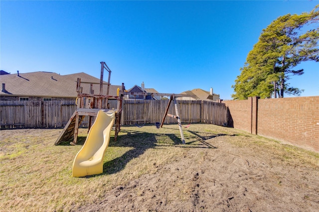 view of play area featuring a lawn