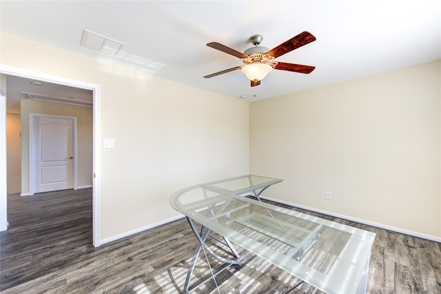 dining room featuring ceiling fan and dark hardwood / wood-style flooring