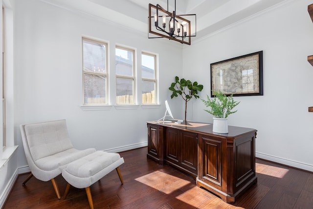 office featuring dark wood-type flooring, crown molding, and a notable chandelier