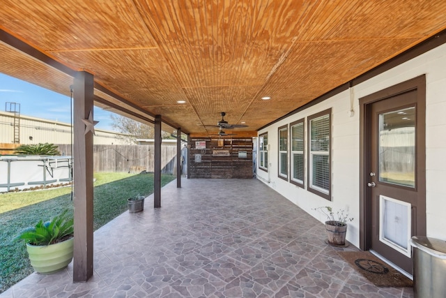 view of patio featuring ceiling fan