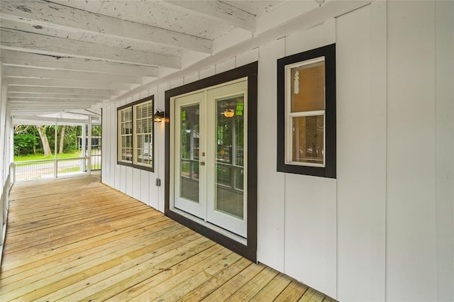 deck featuring french doors and a porch