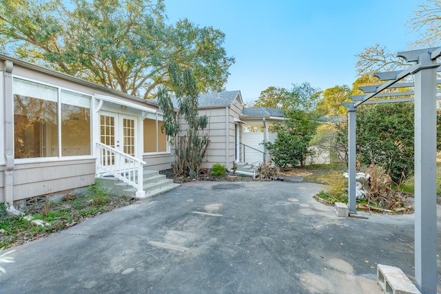 302 E Jackson St, West Columbia, TX 77486 - view of patio featuring a pergola and french doors