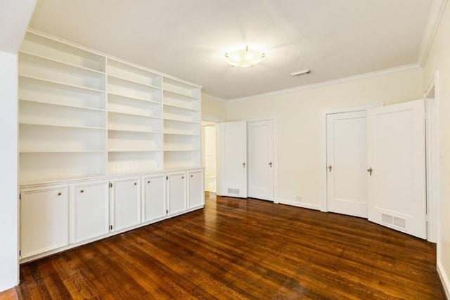 302 E Jackson St, West Columbia, TX 77486 - unfurnished bedroom with dark hardwood / wood-style flooring and ornamental molding