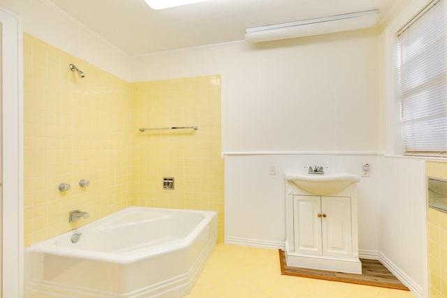 302 E Jackson St, West Columbia, TX 77486 - bathroom with crown molding, wood-type flooring, and sink