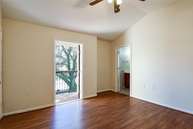 unfurnished room with dark wood-type flooring, ceiling fan, and vaulted ceiling