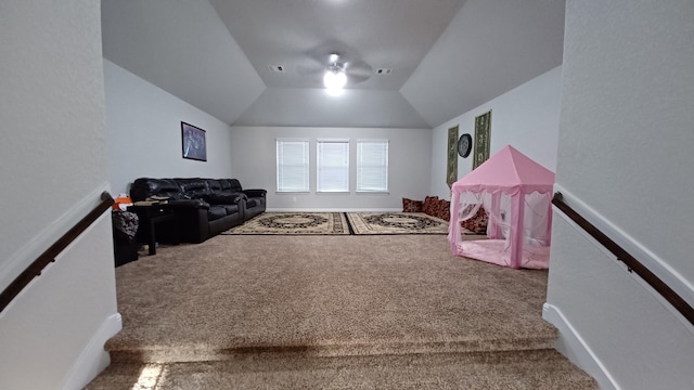 playroom featuring lofted ceiling and carpet floors