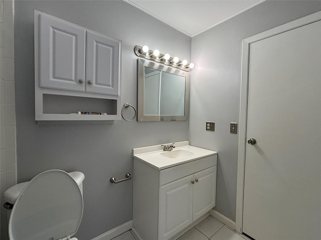 bathroom featuring tile patterned floors, toilet, and vanity