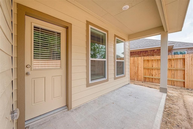 doorway to property with a patio