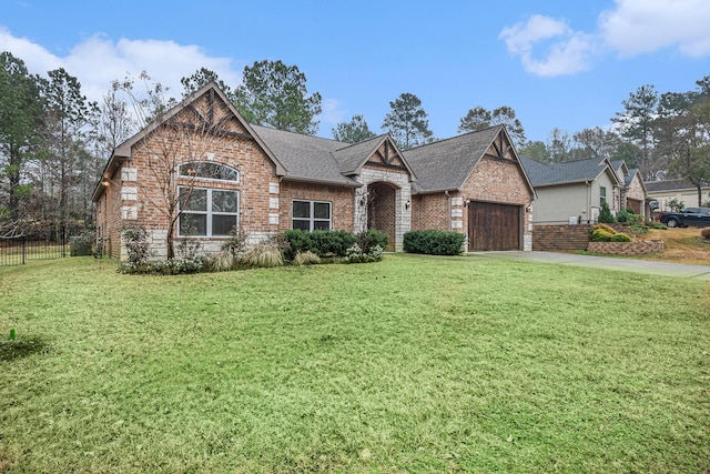 view of front facade with a garage and a front lawn