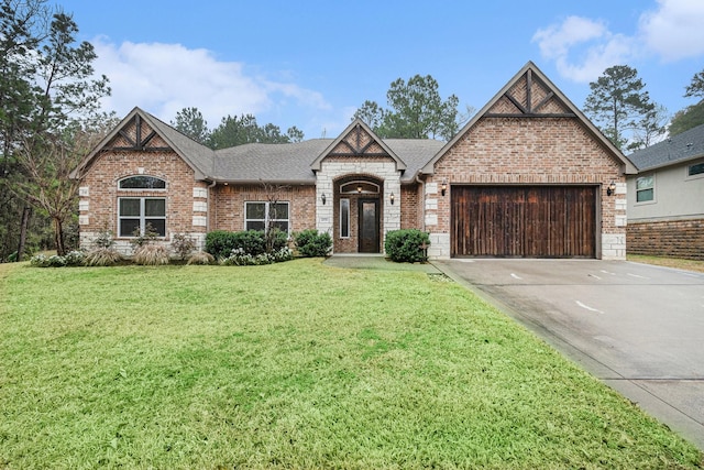 view of front facade featuring a garage and a front lawn