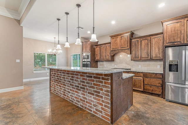 kitchen with a chandelier, a center island, hanging light fixtures, stainless steel appliances, and backsplash