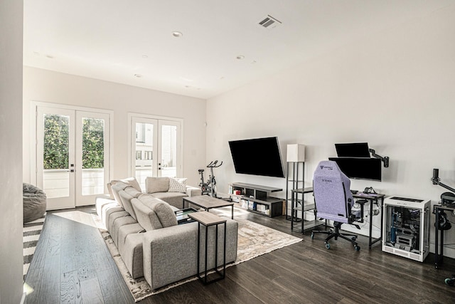 living room with dark wood-type flooring and french doors