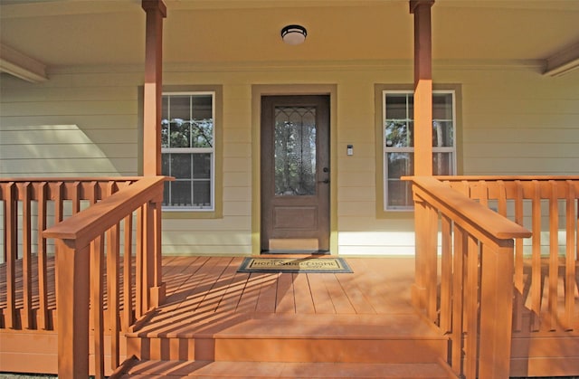 property entrance featuring covered porch