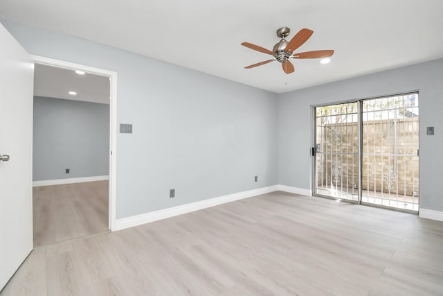 unfurnished room featuring light hardwood / wood-style floors and ceiling fan