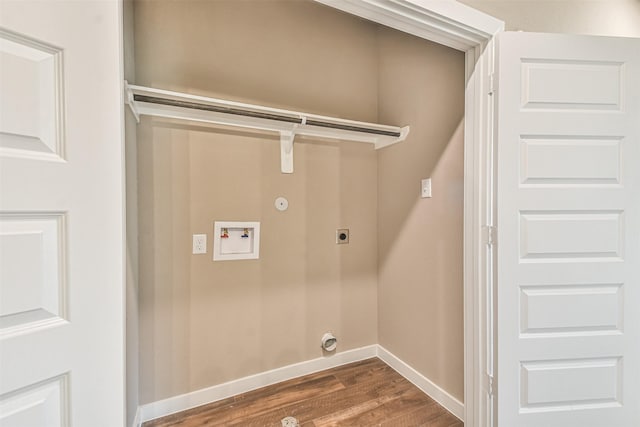 laundry area featuring hookup for a washing machine, gas dryer hookup, electric dryer hookup, and dark hardwood / wood-style flooring