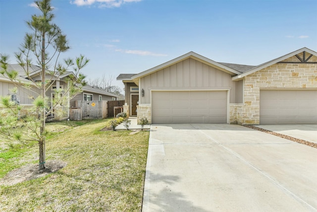 ranch-style home featuring a garage and a front lawn