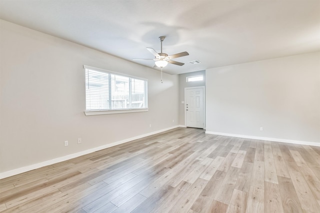 unfurnished room with ceiling fan and light hardwood / wood-style flooring