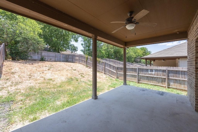 view of patio featuring ceiling fan