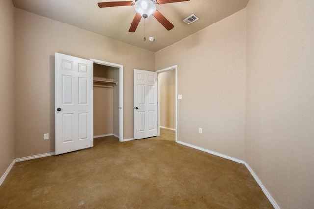 unfurnished bedroom featuring ceiling fan, a closet, and carpet