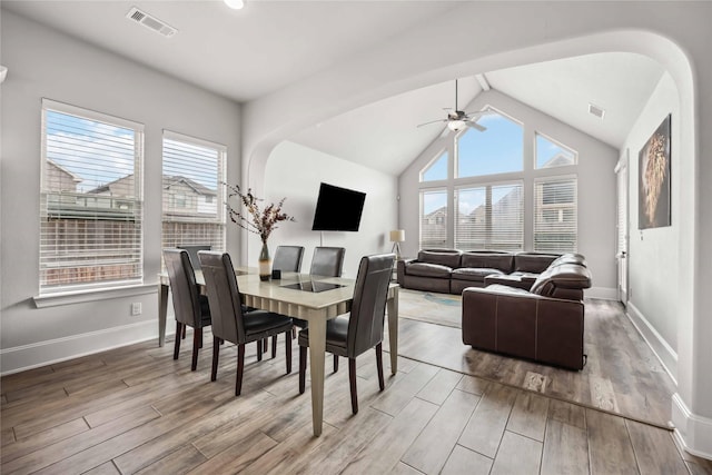 dining space featuring lofted ceiling and ceiling fan