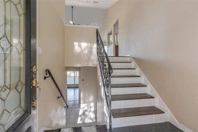 stairs with a towering ceiling