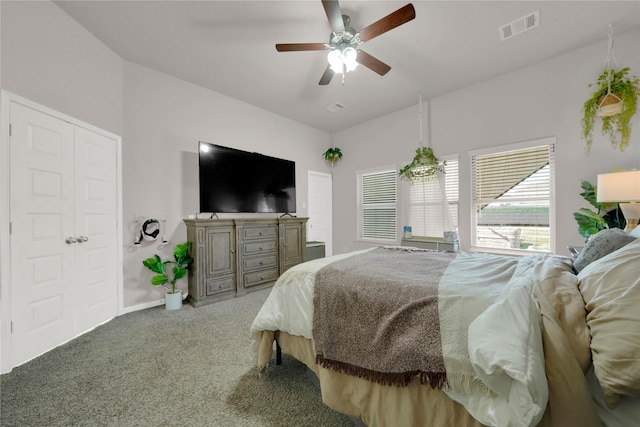 carpeted bedroom featuring ceiling fan