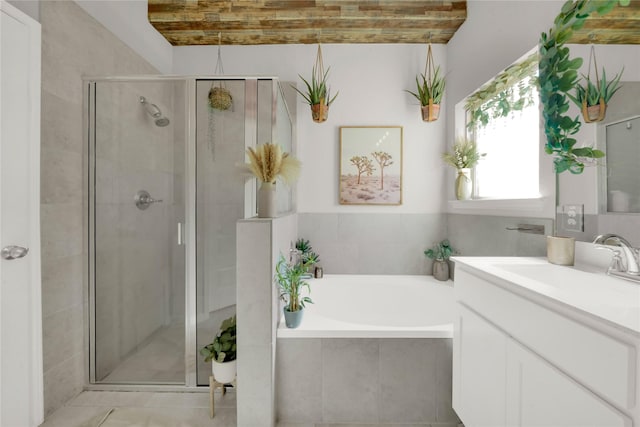 7 Calistoga Cir, Manvel, TX 77578 - bathroom featuring a bath, a stall shower, and vanity