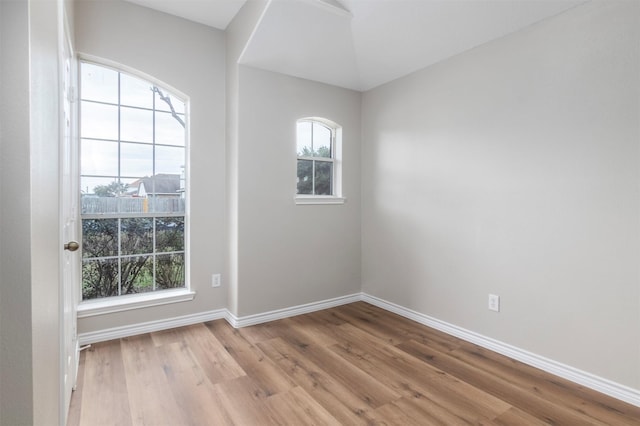 empty room with light wood-type flooring