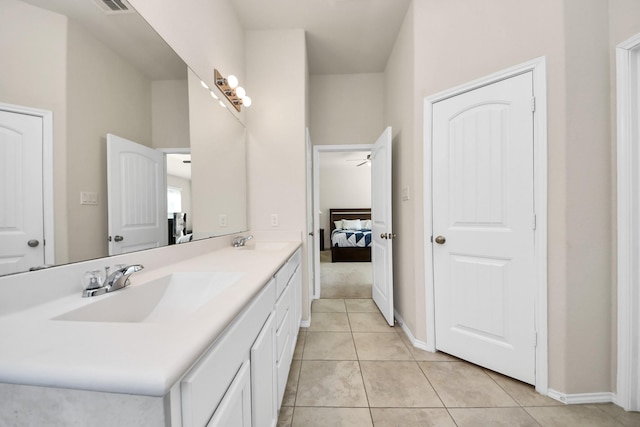 bathroom with vanity and tile patterned floors