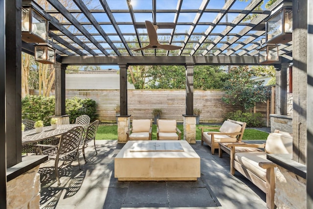 view of patio with an outdoor living space and a pergola