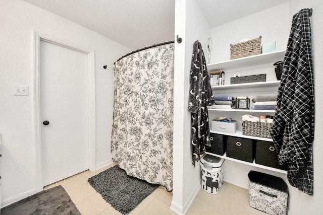 bathroom featuring tile patterned flooring