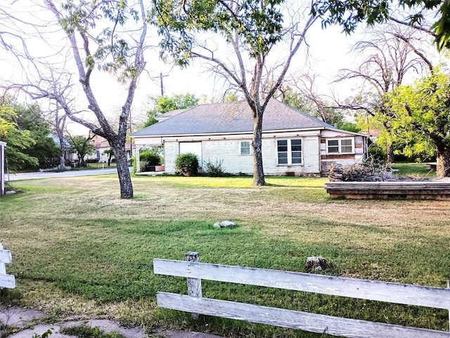 view of front of home with a front lawn