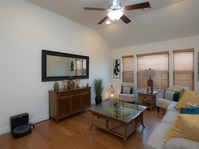 living room with vaulted ceiling, ceiling fan, and hardwood / wood-style floors