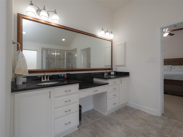 bathroom with lofted ceiling, vanity, ceiling fan, and an enclosed shower