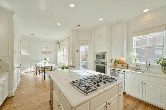 bar featuring white cabinetry, dark hardwood / wood-style flooring, sink, and light stone counters