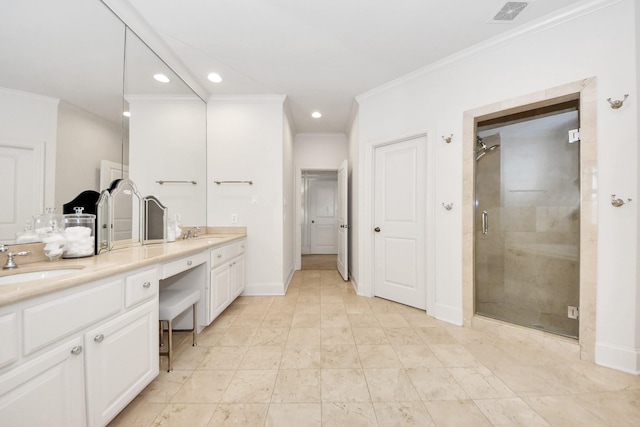 bathroom with crown molding, vanity, and an enclosed shower