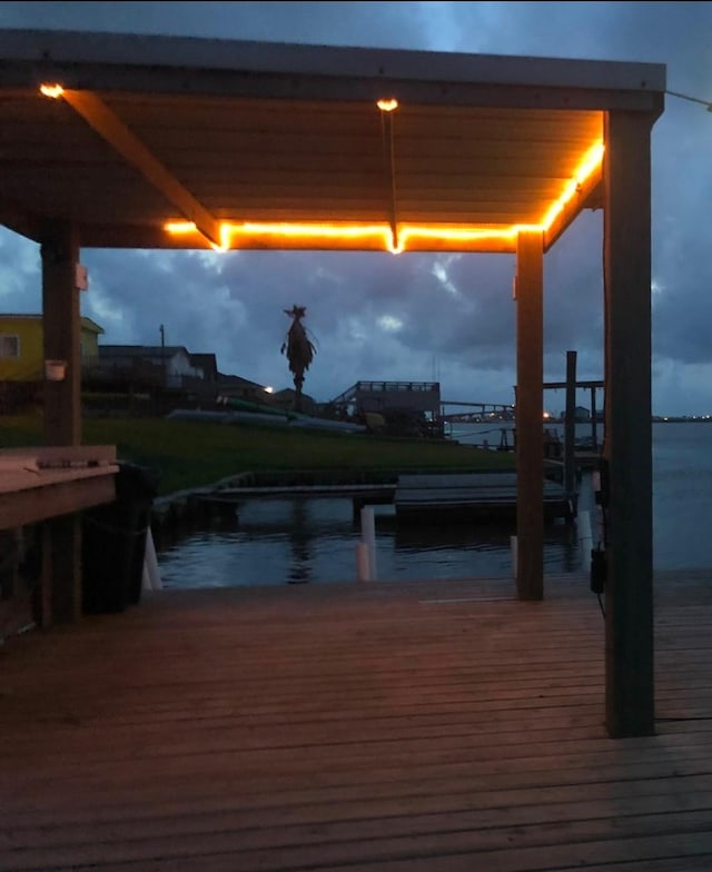 dock area featuring a water view