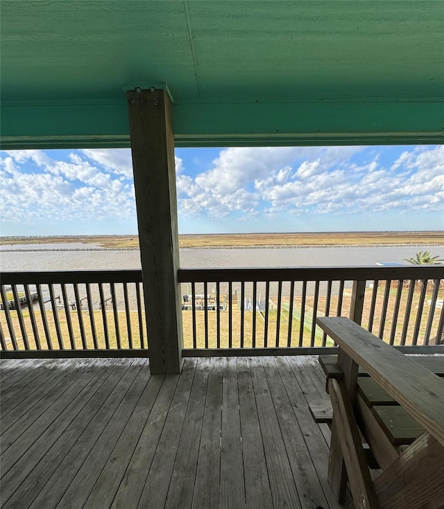 deck featuring a water view