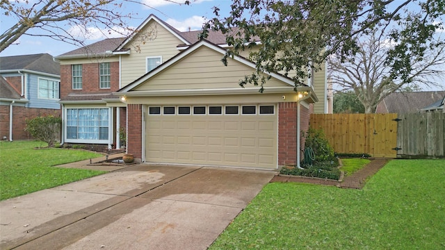 view of front of home featuring a garage and a front yard