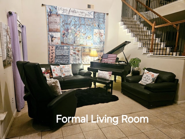 living room with tile patterned flooring